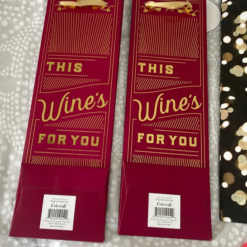 Set of 10 miscellaneous wine gift bags. Great for the upcoming holidays
